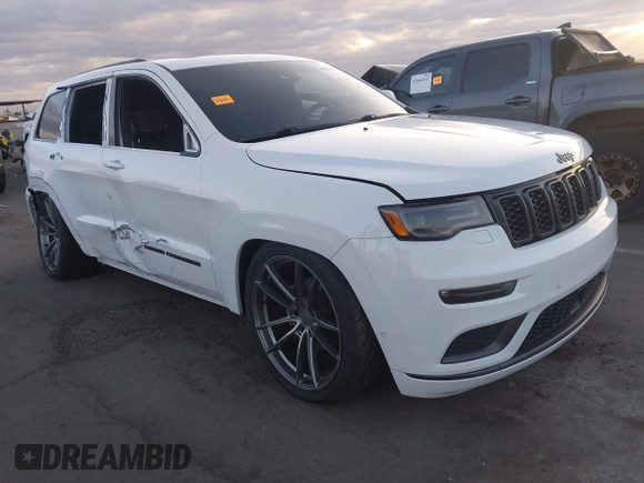 2018 Jeep Grand Cherokee Overland z VIN 1C4RJFCG7JC158464, wystawiony jako IAAI lot #42056386 z przebiegiem 94 608 mil mil oraz . Historia ofert i sprzedaży dostępna na DreamBid. Obrazek 1.