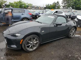 2021 Mazda MX-5 Miata Grand Touring with VIN JM1NDAD76M0452192, listed as a Copart auction lot 66387614 with 21,659 mi miles and Salvage title. Bid and sale history available at DreamBid. Image 1.
