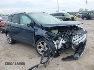 2019 Ford Escape Titanium with VIN 1FMCU9J95KUC19062, listed as a IAAI auction lot 42112188 with 26,100 mi miles. Bid and sale history available at carsss.com. Image 1.