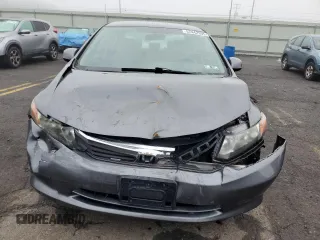 2012 Honda Civic LX z VIN 2HGFB2F50CH324974, wystawiony jako Copart lot #57442305 z przebiegiem 124 462 mil mil oraz Szkoda całkowita • Salvage title. Historia ofert i sprzedaży dostępna na DreamBid. Obrazek 5.