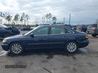 2006 Hyundai Azera SE with VIN KMHFC46F86A110023, listed as a IAAI auction lot 41427898 with 197,837 mi miles and . Bid and sale history available at DreamBid. Image 14.