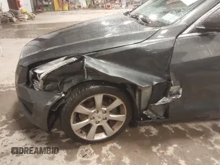 2014 Cadillac ATS Standard AWD z VIN 1G6AG5RX8E0174762, wystawiony jako IAAI lot #42323296 z przebiegiem 107 213 mil mil oraz . Historia ofert i sprzedaży dostępna na DreamBid. Obrazek 6.