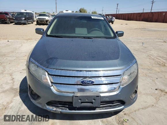 2012 Ford Fusion SE z VIN 3FAHP0HA0CR213729, wystawiony jako Copart lot #52458665 z przebiegiem 107 419 mil mil oraz Czysty tytuł • Clean title. Historia ofert i sprzedaży dostępna na DreamBid. Obrazek 5.
