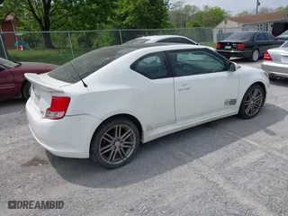 2012 Scion tC with VIN JTKJF5C73C3041792, listed as a IAAI auction lot 42117978 with 111,815 mi miles. Bid and sale history available at carsss.com. Image 4.