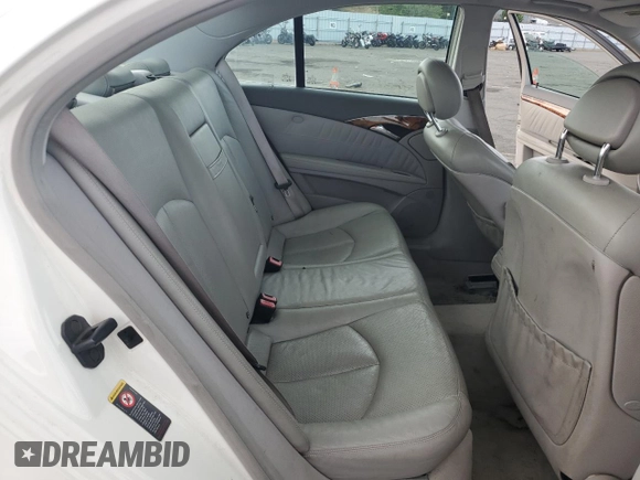 2004 Mercedes-Benz E 320 with VIN WDBUF65JX4A430542, listed as a Copart auction lot 51974815 with 195,666 mi miles and Salvage Title. Bid and sale history available at carsss.com. Image 10.