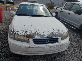 2000 Toyota Camry CE z VIN 4T1BG22K5YU936033, wystawiony jako Copart lot #57636215 z przebiegiem 242 889 mil mil oraz Szkoda całkowita • Salvage title. Historia ofert i sprzedaży dostępna na DreamBid. Obrazek 5.