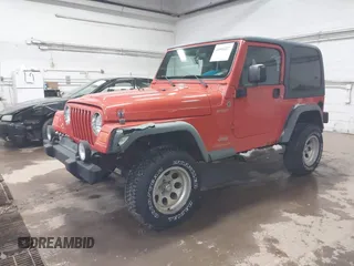 2006 Jeep Wrangler Sport with VIN 1J4FA49S06P729497, listed as a IAAI auction lot 41906227 with 134,573 mi miles. Bid and sale history available at carsss.com. Image 6.