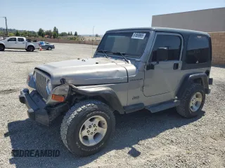 2000 Jeep Wrangler SE with VIN 1J4FA29P7YP737289, listed as a Copart auction lot 61869865 with 91,097 mi miles and Salvage title. Bid and sale history available at DreamBid. Image 1.