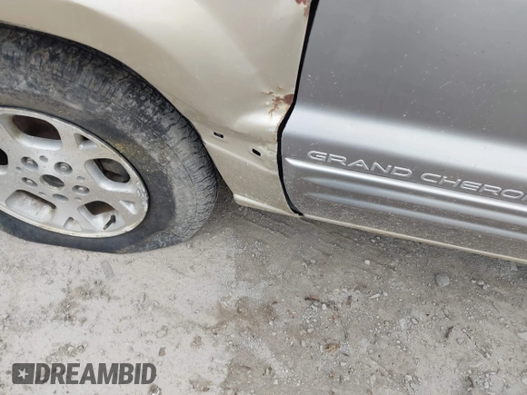 1999 Jeep Grand Cherokee Limited with VIN 1J4GW68SXXC664055, listed as a IAAI auction lot 42339125 with 219,792 mi miles and . Bid and sale history available at DreamBid. Image 12.