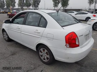 2009 Hyundai Accent Auto GLS with VIN KMHCN46C79U333109, listed as a IAAI auction lot 42023502 with 230,123 mi miles. Bid and sale history available at carsss.com. Image 3.