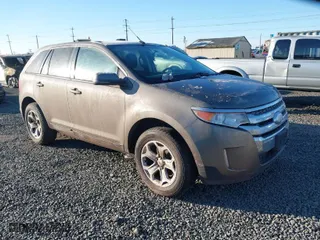 2013 Ford Edge SEL with VIN 2FMDK4JC5DBA97837, listed as a IAAI auction lot 41549296 with 128,943 mi miles. Bid and sale history available at carsss.com. Image 1.