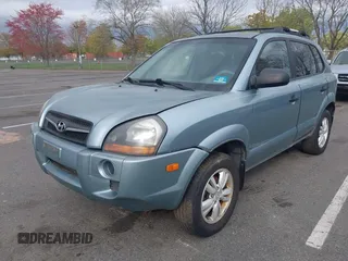 2009 Hyundai Tucson GLS with VIN KM8JM12B79U991776, listed as a IAAI auction lot 42088648 with 219,207 mi miles. Bid and sale history available at carsss.com. Image 2.