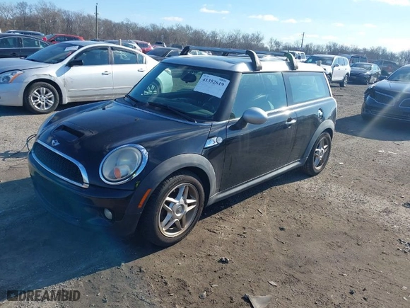 2009 MINI Cooper Clubman S with VIN WMWMM33559TP74672, listed as a IAAI auction lot 41352619 with 163,129 mi miles. Bid and sale history available at carsss.com. Image 2.