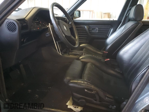 1989 BMW 3 Series 325i with VIN WBAAD2305KED23370, listed as a Copart auction lot 43777225 with 194,949 mi miles and Salvage Title. Bid and sale history available at carsss.com. Image 7.