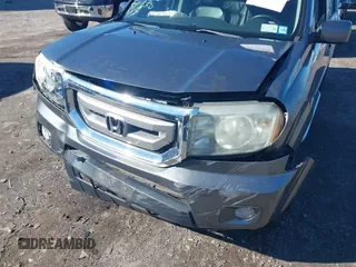 2011 Honda Pilot EX-L with VIN 5FNYF4H51BB027978, listed as a IAAI auction lot 41721429 with 111,281 mi miles. Bid and sale history available at carsss.com. Image 6.