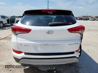 2017 Hyundai Tucson Sport z VIN KM8J33A29HU591930, wystawiony jako Copart lot #60057505 z przebiegiem 70 037 mil mil oraz Szkoda całkowita • Salvage title. Historia ofert i sprzedaży dostępna na DreamBid. Obrazek 6.