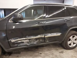 2012 Jeep Grand Cherokee Laredo with VIN 1C4RJFAG5CC351539, listed as a IAAI auction lot 41861533 with 166,909 mi miles. Bid and sale history available at carsss.com. Image 6.