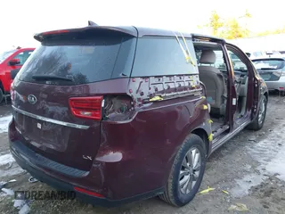 2020 Kia Sedona LX with VIN KNDMB5C18L6617371, listed as a IAAI auction lot 41378524 with 59,092 mi miles. Bid and sale history available at carsss.com. Image 4.