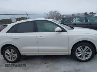 2017 Audi Q3 Premium z VIN WA1BCCFS4HR016424, wystawiony jako IAAI lot #41627278 z przebiegiem 60 028 mil mil oraz . Historia ofert i sprzedaży dostępna na DreamBid. Obrazek 13.