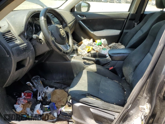 2014 Mazda CX-5 Sport with VIN JM3KE4BE6E0350595, listed as a Copart auction lot 61826475 with Not provided miles and Clean title. Bid and sale history available at DreamBid. Image 7.