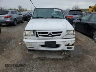 2002 Mazda B-Series 2WD Truck DS with VIN 4F4YR46E22TM06387, listed as a Copart auction lot 80560224 with 228,391 mi miles and Salvage Title. Bid and sale history available at carsss.com. Image 5.