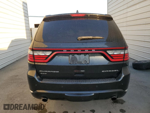 2016 Dodge Durango Citadel Anodized Platinum with VIN 1C4SDJET0GC428990, listed as a Copart auction lot 83581244 with 144,980 mi miles and Clean title. Bid and sale history available at DreamBid. Image 6.