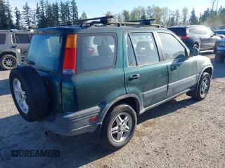 2001 Honda CR-V EX with VIN JHLRD18661C000677, listed as a IAAI auction lot 42020034 with 133,192 mi miles. Bid and sale history available at carsss.com. Image 4.