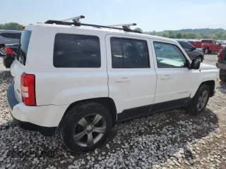 2015 Jeep Patriot High Altitude with VIN 1C4NJRFB5FD114125, listed as a Copart auction lot 62475615 with 104,438 mi miles and Salvage title. Bid and sale history available at DreamBid. Image 3.