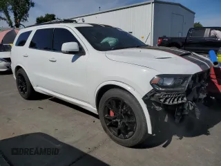 2018 Dodge Durango SRT with VIN 1C4SDJGJ4JC150324, listed as a Copart auction lot 63388975 with 126,622 mi miles and Salvage title. Bid and sale history available at DreamBid. Image 4.