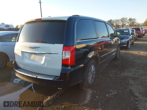 2011 Chrysler Town & Country Limited with VIN 2A4RR6DG4BR716460, listed as a IAAI auction lot 41073221 with 136,779 mi miles. Bid and sale history available at carsss.com. Image 4.