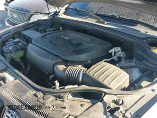 2017 Jeep Grand Cherokee Laredo z VIN 1C4RJFAG6HC704314, wystawiony jako IAAI lot #43068712 z przebiegiem 214 673 mil mil oraz . Historia ofert i sprzedaży dostępna na DreamBid. Obrazek 18.