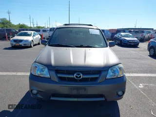 2006 Mazda Tribute S with VIN 4F2CZ04196KM12520, listed as a IAAI auction lot 41872221 with Not Provided miles and . Bid and sale history available at carsss.com. Image 6.