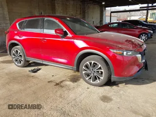 2022 Mazda CX-5 2.5 S Premium Package with VIN JM3KFBDM7N0537947, listed as a IAAI auction lot 41195784 with 23,205 mi miles. Bid and sale history available at carsss.com. Image 1.