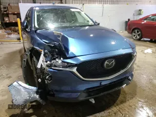 2018 Mazda CX-5 Grand Touring with VIN JM3KFBDM1J0304706, listed as a Copart auction lot 46123415 with 104,004 mi miles and Salvage title. Bid and sale history available at DreamBid. Image 14.