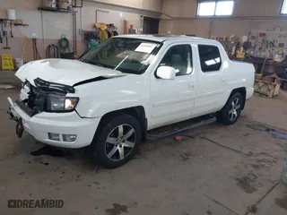2014 Honda Ridgeline SE with VIN 5FPYK1F6XEB010582, listed as a IAAI auction lot 41641803 with 69,923 mi miles. Bid and sale history available at carsss.com. Image 17.