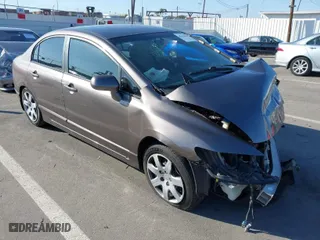 2011 Honda Civic Sdn LX with VIN 19XFA1F54BE048532, listed as a IAAI auction lot 41636667 with 117,065 mi miles. Bid and sale history available at carsss.com. Image 1.