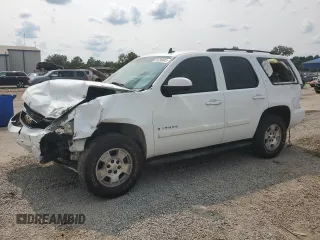 2007 Chevrolet Tahoe LTZ with VIN 1GNFC13J47J282392, listed as a Copart auction lot 59230605 with 162,243 mi miles and Salvage title. Bid and sale history available at DreamBid. Image 1.