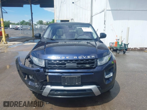 2015 Land Rover Range Rover Evoque Dynamic z VIN SALVT2BG1FH018285, wystawiony jako IAAI lot #42687773 z przebiegiem 92 273 mil mil oraz . Historia ofert i sprzedaży dostępna na DreamBid. Obrazek 13.