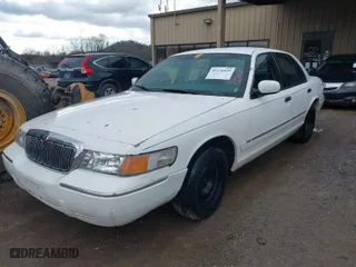 2002 Mercury Grand Marquis GS with VIN 2MEFM74W82X628008, listed as a IAAI auction lot 41576839 with 157,874 mi miles. Bid and sale history available at carsss.com. Image 2.
