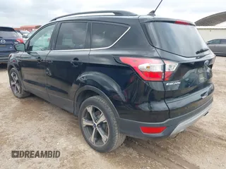 2018 Ford Escape SEL with VIN 1FMCU0HD0JUB24722, listed as a IAAI auction lot 42049106 with 122,400 mi miles and . Bid and sale history available at carsss.com. Image 3.