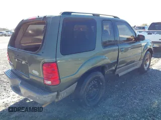 2002 Ford Explorer Sport Value with VIN 1FMYU60E32UD12858, listed as a IAAI auction lot 41810679 with 179,900 mi miles and . Bid and sale history available at DreamBid. Image 6.
