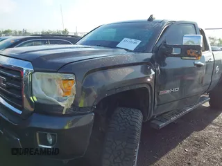 2015 GMC Sierra 2500HD SLT with VIN 1GT12ZE84FF553371, listed as a IAAI auction lot 42173249 with 247,703 mi miles and . Bid and sale history available at DreamBid. Image 6.