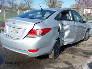 2013 Hyundai Accent GLS with VIN KMHCT4AE4DU477465, listed as a IAAI auction lot 41930256 with 48,877 mi miles and . Bid and sale history available at carsss.com. Image 4.