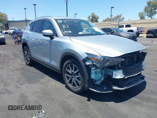 2018 Mazda CX-5 Grand Touring с VIN JM3KFBDM3J0343782, выставлен на аукционе IAAI как лот 42527044 с пробегом 60 180 миль миль и . История ставок и продаж доступна на DreamBid. Изображение 1.