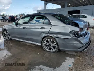 2014 Mercedes-Benz E 350 Sport with VIN WDDHF5KB7EA823075, listed as a Copart auction lot 56886345 with 122,892 mi miles and Salvage title. Bid and sale history available at DreamBid. Image 2.