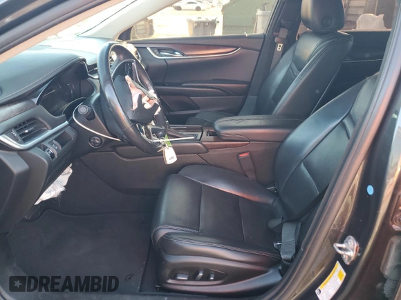 2018 Cadillac XTS Luxury with VIN 2G61M5S36K9133693, listed as a Copart auction lot 42278415 with 56,514 mi miles and Salvage Title. Bid and sale history available at DreamBid. Image 7.