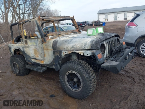 2003 Jeep Wrangler Sport with VIN 1J4FA49S93P374406, listed as a IAAI auction lot 41648982 with Not provided miles and . Bid and sale history available at DreamBid. Image 1.