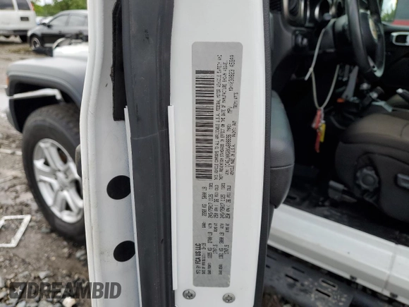 2019 Jeep Wrangler Sport S with VIN 1C4GJXAG0KW608696, listed as a Copart auction lot 57963455 with 51,955 mi miles and Salvage title. Bid and sale history available at DreamBid. Image 12.