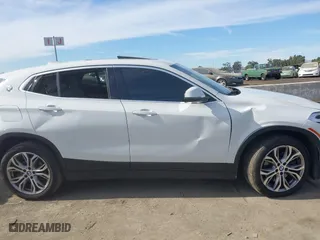2020 BMW X2 sDrive28i with VIN WBXYH9C01L5P15004, listed as a IAAI auction lot 41128060 with 86,052 mi miles. Bid and sale history available at carsss.com. Image 12.