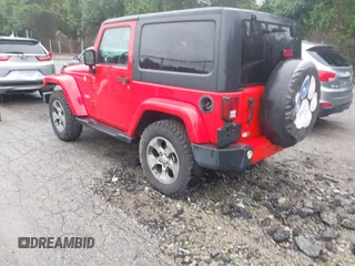 2016 Jeep Wrangler Sahara with VIN 1C4AJWBG4GL273644, listed as a IAAI auction lot 42692464 with 160,893 mi miles and . Bid and sale history available at DreamBid. Image 3.